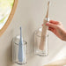 Wall‑Mounted Electric Toothbrush Holder — Clear Plastic Storage Rack