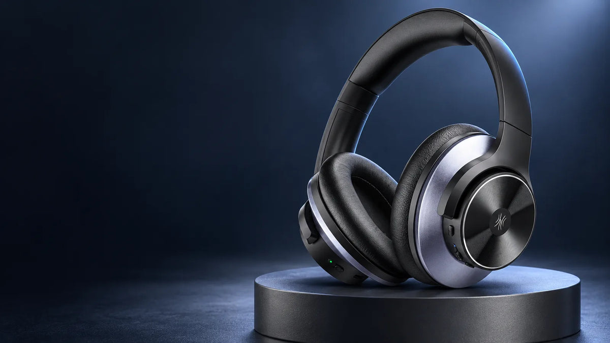 Styled studio photograph of the black Oneodio A Series headphones on a dark display plinth